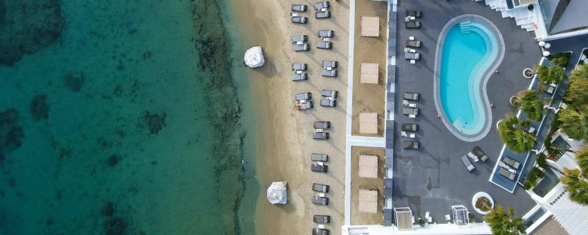 A view from above at Ornos beach at the island of Mykonos.