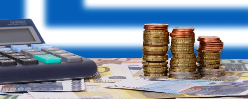 Calculator with money and coins in front of flag of Greece