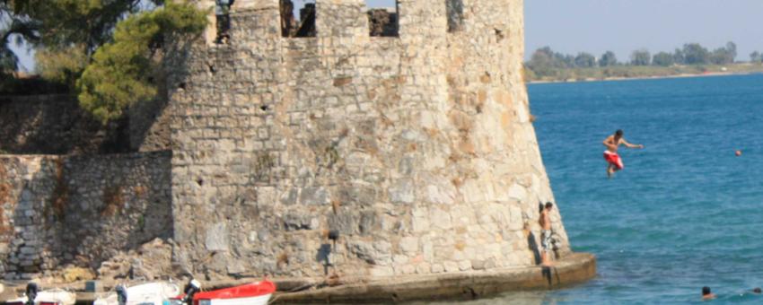 Kids diving in Nafpaktos port