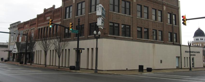 Buildings on the northeastern corner of the intersection of Anderson (State Road 13) and A Streets in central Elwood, Indiana.