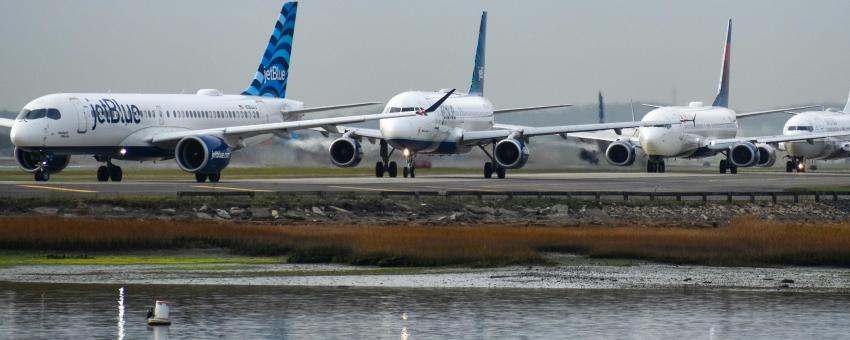 Planes lining up to take off at Boston Logan