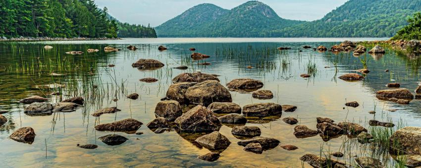 Acadia National Park is stunning and this is one of the most famous photographer spots. With crystal clear lake water and the two mountain tops off in the distance.
