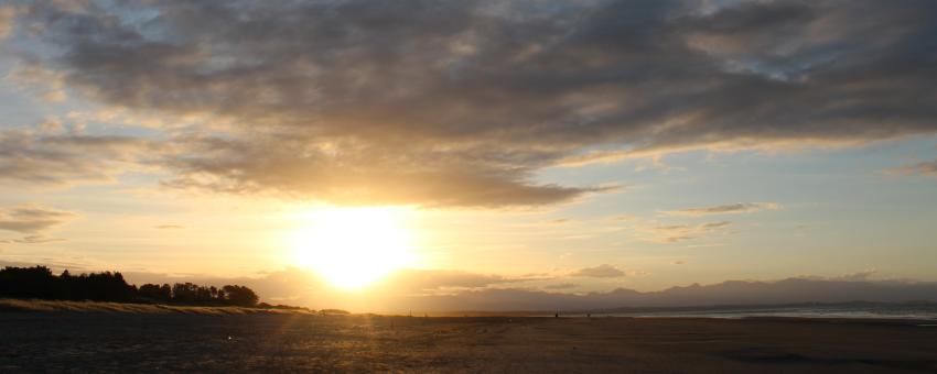 Sun rays over Tahunanui Beach