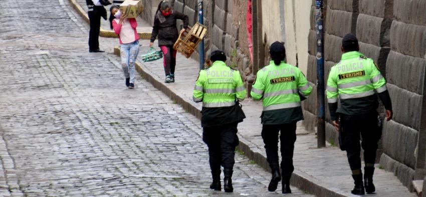 Police wear green day-glo jackets