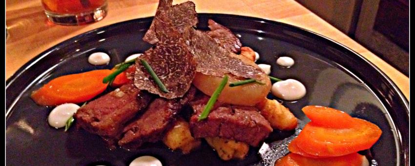 Braised beef tips with shaved black truffle