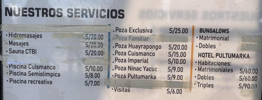 Menu of options and prices at Baños del Inca